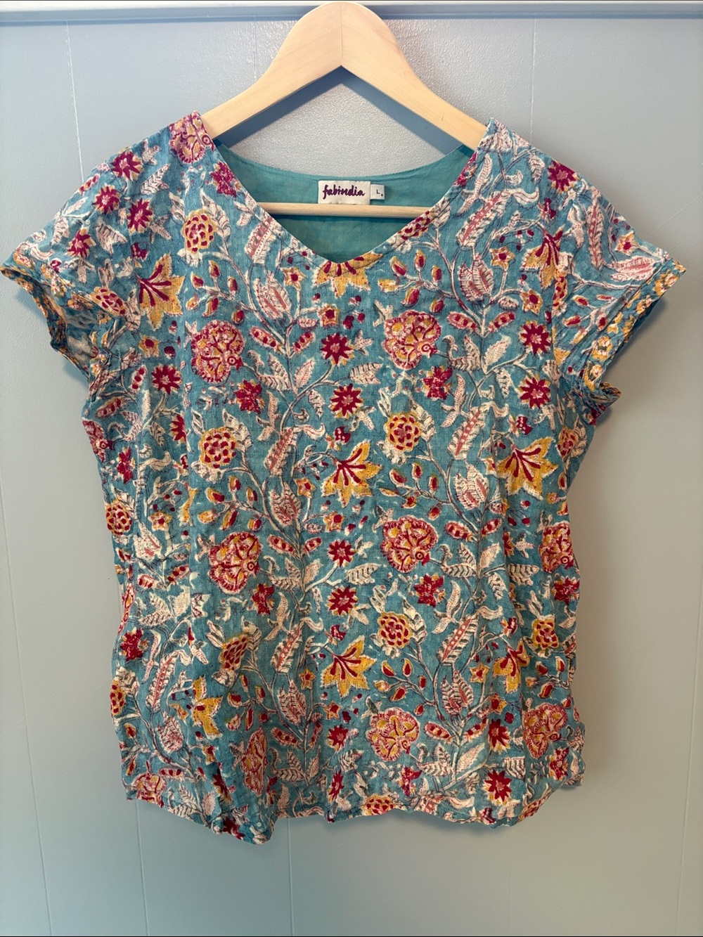 fabindia Teal Floral Short-Sleeve Top with Red and Yellow Accents